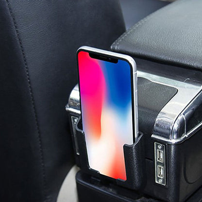 Telefonas vertikaliai laikomas prie automobilio porankio