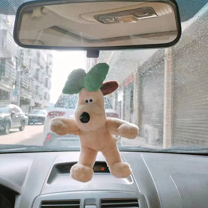 Šuniuko formos automobilio dekoracija parodytas prieš ir po naudojimo
