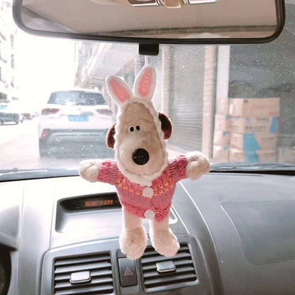 Šuniuko formos automobilio dekoracija parodytas kasdienio naudojimo situacijoje