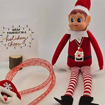 Elfas su šventiniu lankeliu ir užduoties kortele
