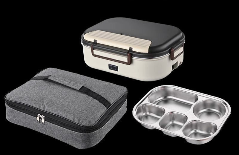 Trijų maisto indų rinkinys: juodas, pilkas ir sidabrinis, įvairių formų.