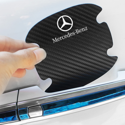 Automobilio ženkliukai nuo įbrėžimų - juodi lipdukai su automobilio ženklu ant baltos rankenos, variantas 21