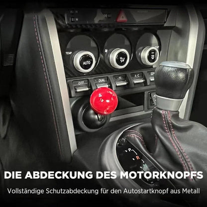 Raudona svirtelė ant centrinės automobilio konsolės