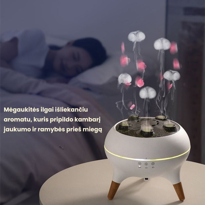 Difuzorius „Medūza“ su spalvotais garais šalia miegančio žmogaus