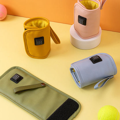 Kelių spalvų išskleisti buteliuko šildytuvai ant stalo