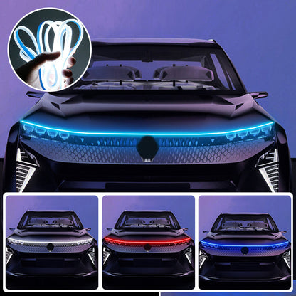 Balta LED juosta sumontuota po automobilio variklio dangčiu