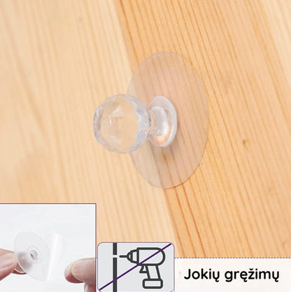 Skaidri rankenėlė ant medinės spintelės be gręžimo