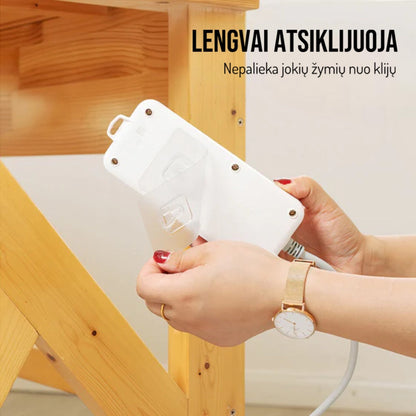 Lipnaus kabliuko plokštelė nuimama nuo medinio paviršiaus