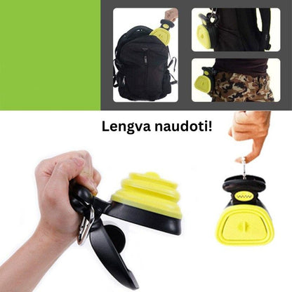 Geltonos surinkimo žnyplės laikomos rankoje ir prisegtos karabinu