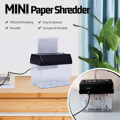 Mini popieriaus smulkintuvas ant skaidrios dėžės